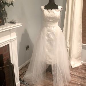 Wedding dress with detachable train.